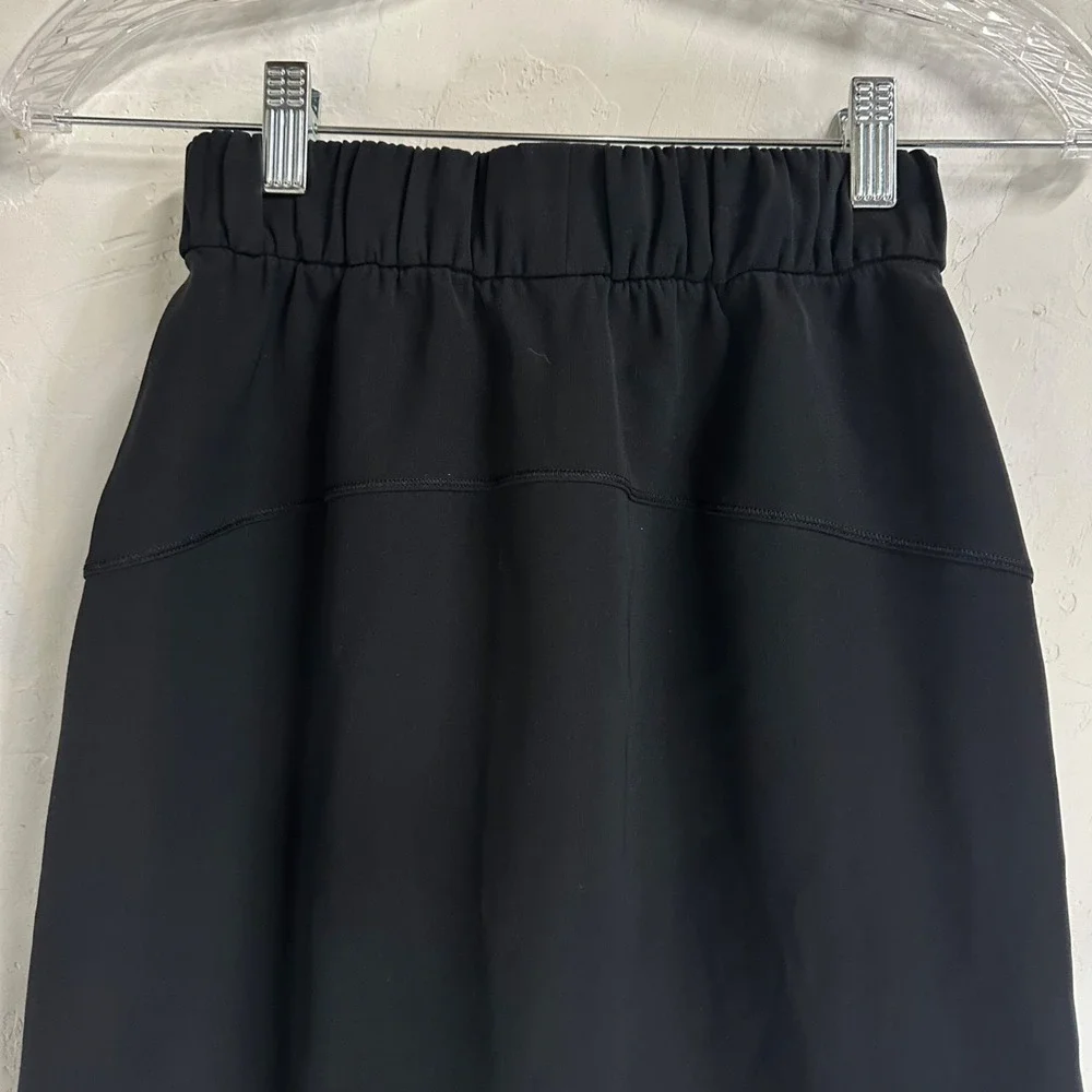 Lululemon Athletic On The Fly Skirt Black Drawstring Pockets Women's 2 Tennis